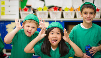 Elementary school students in Chicago goof around backstage before a performance of The Princess & The Pea with Compass Creative Dramatics
